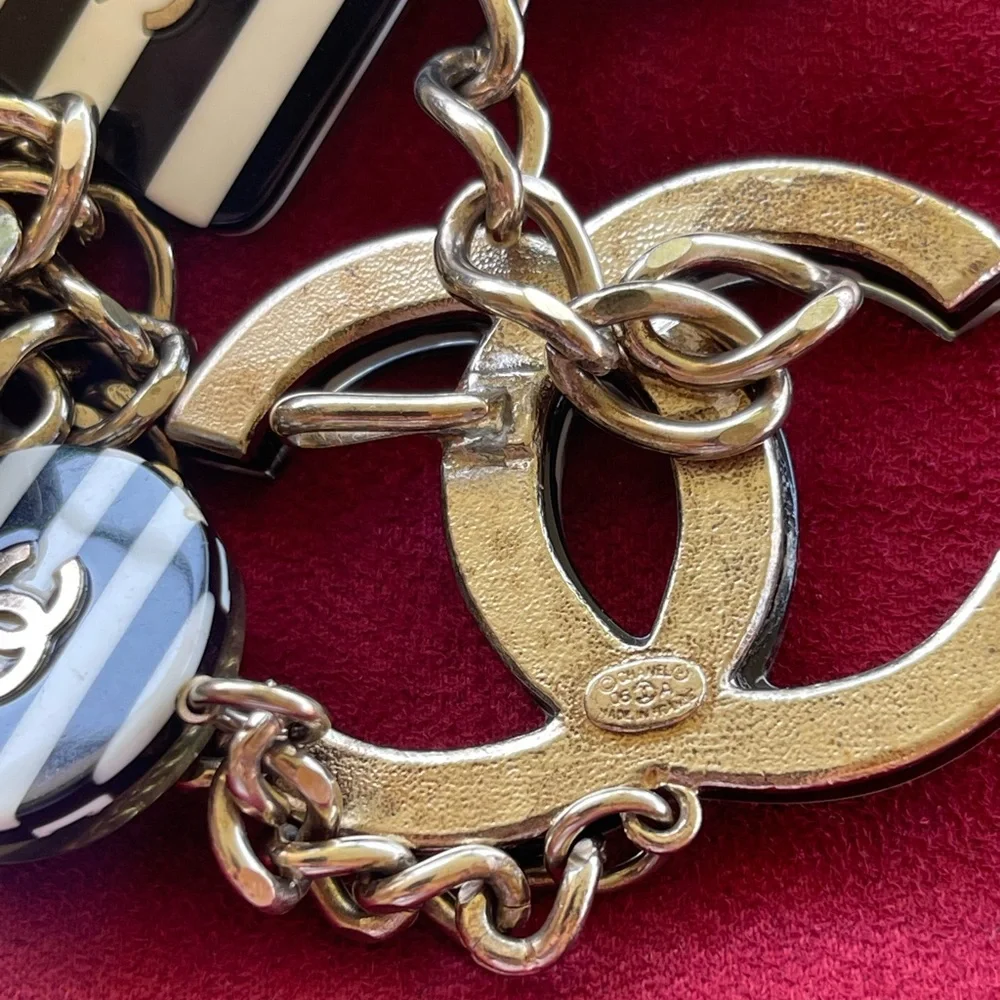 CHANEL Gold Chain Belt with Black and White Striped Enamel Charms